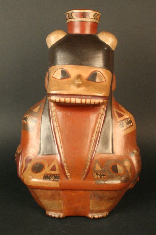 Botella antropomorfa: sacrificador