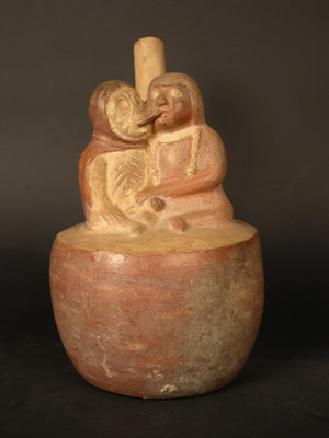 Botella asa-estribo: Mujer masturbando a ser esquelético con capucha roja Museo Larco, Lima – Perú / ML004342